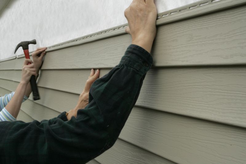 Seamless Vinyl Siding Application